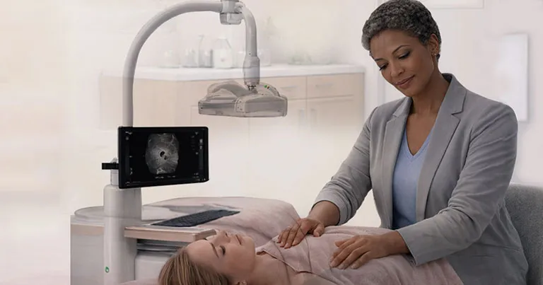 Radiologist performing ABUS breast screening at Genesis while answering common patient questions